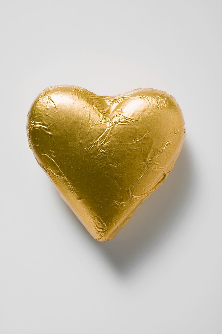 Chocolate heart in gold foil