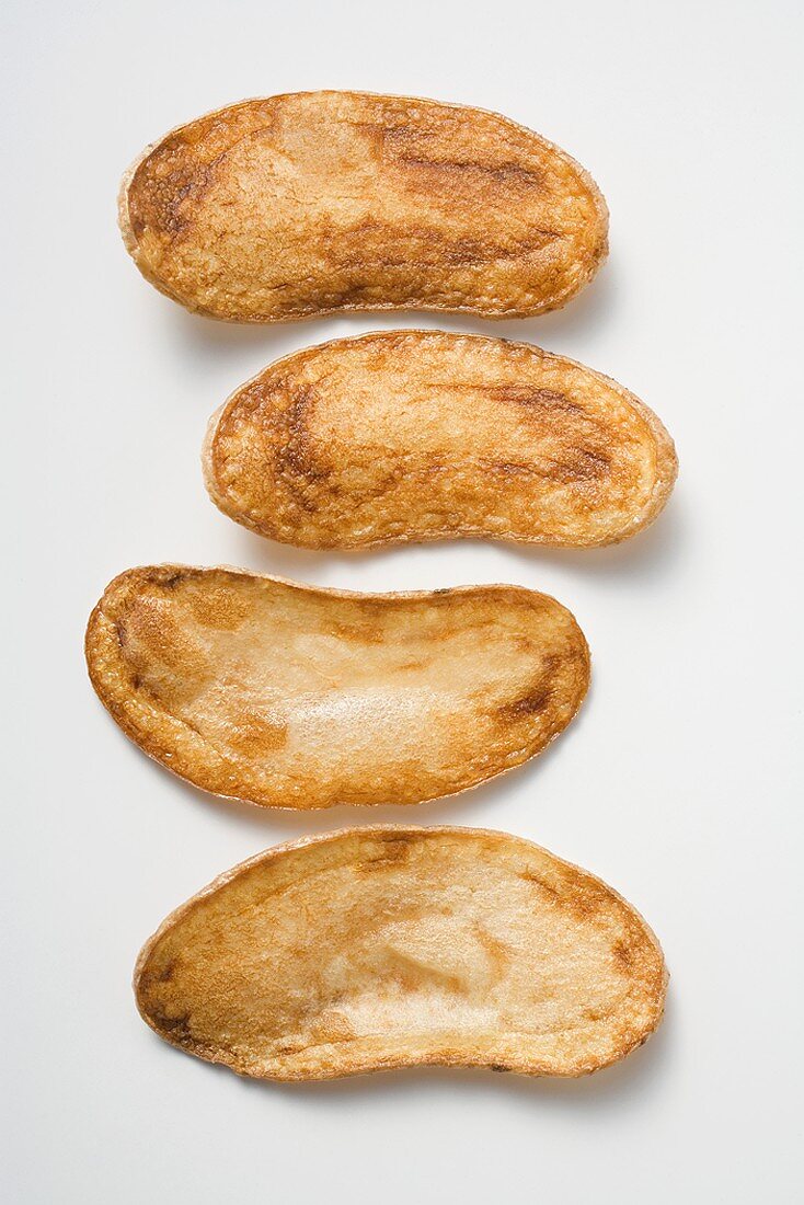 Vier selbstgemachte Kartoffelchips