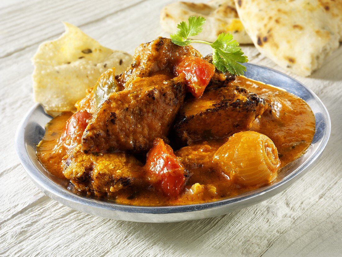 Jalfrezi (spicy meat curry, India), with flatbread
