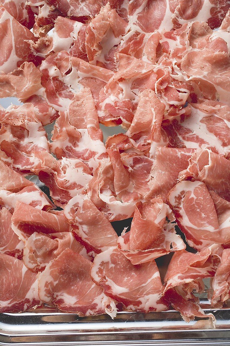 Schinkenspeck (dry-cured pork) thinly sliced (full-frame)