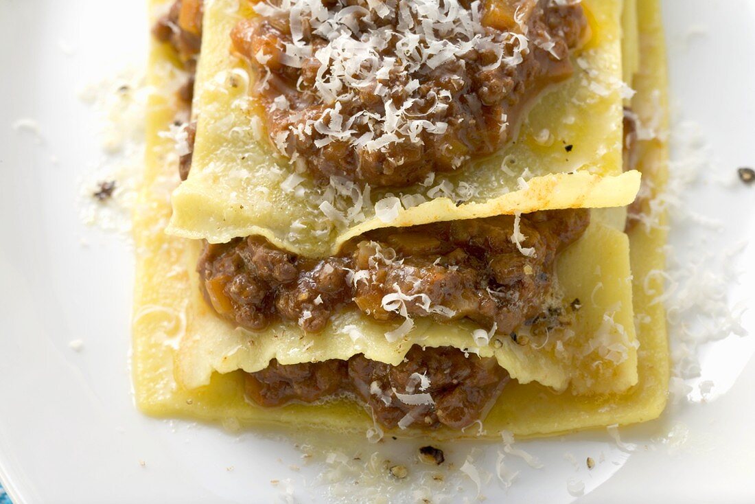 Lasagne with meat sauce and grated cheese