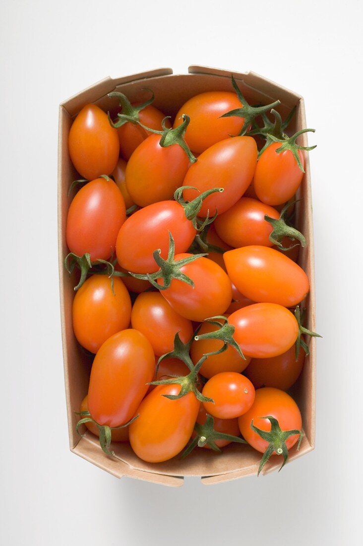 Cherry tomatoes in woodchip basket