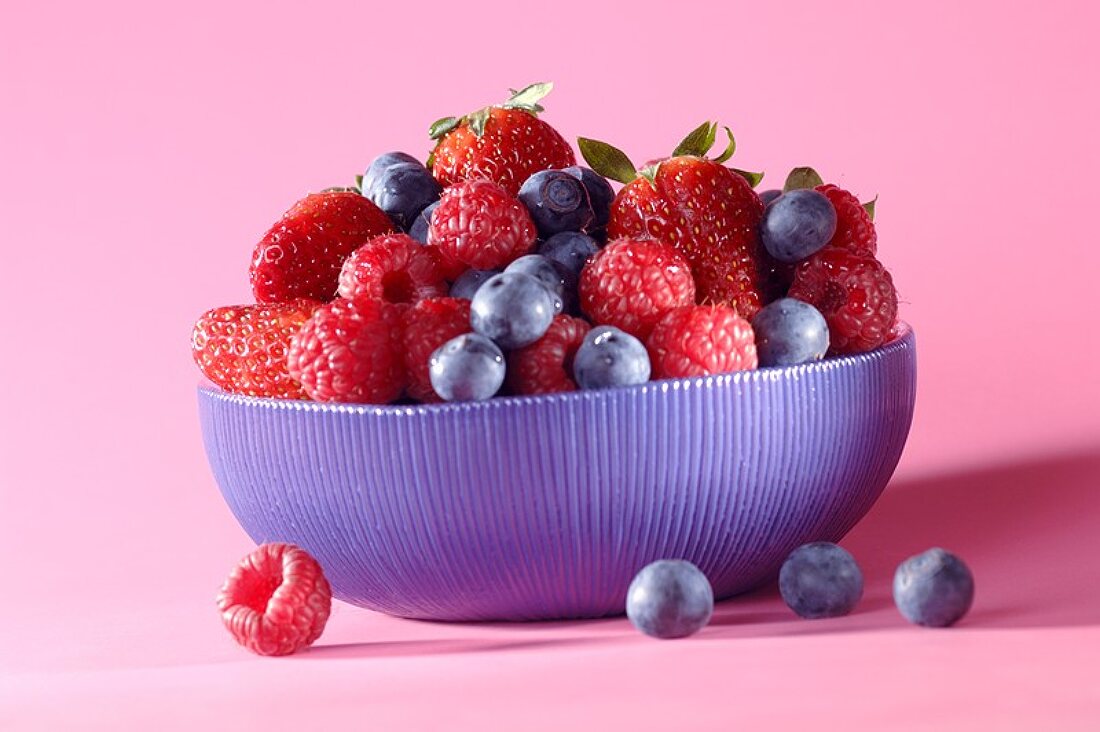 Assorted berries in blue bowl