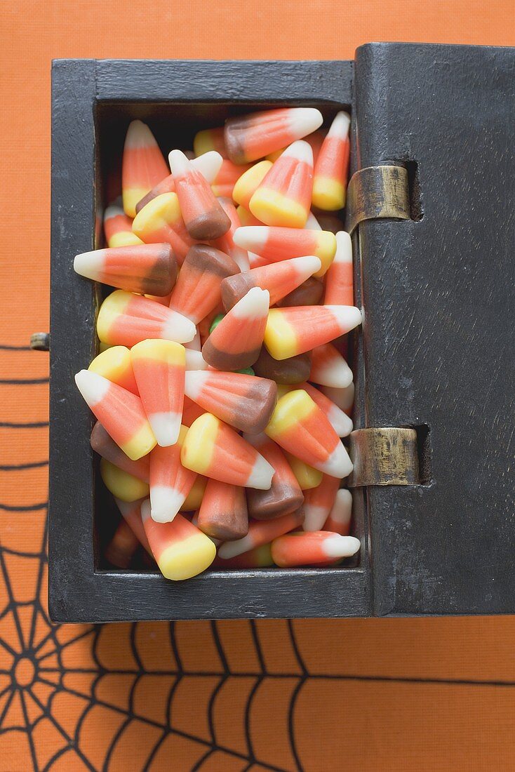 Candy corn in treasure chest for Halloween