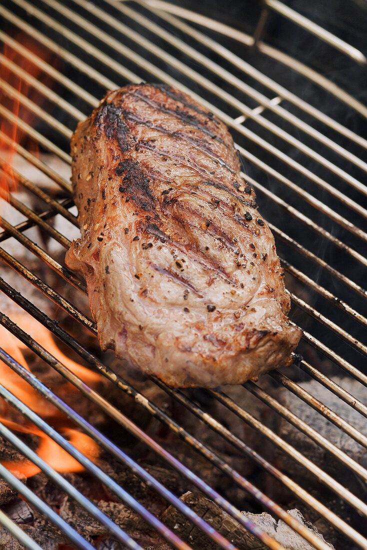 Beef steak on a barbecue