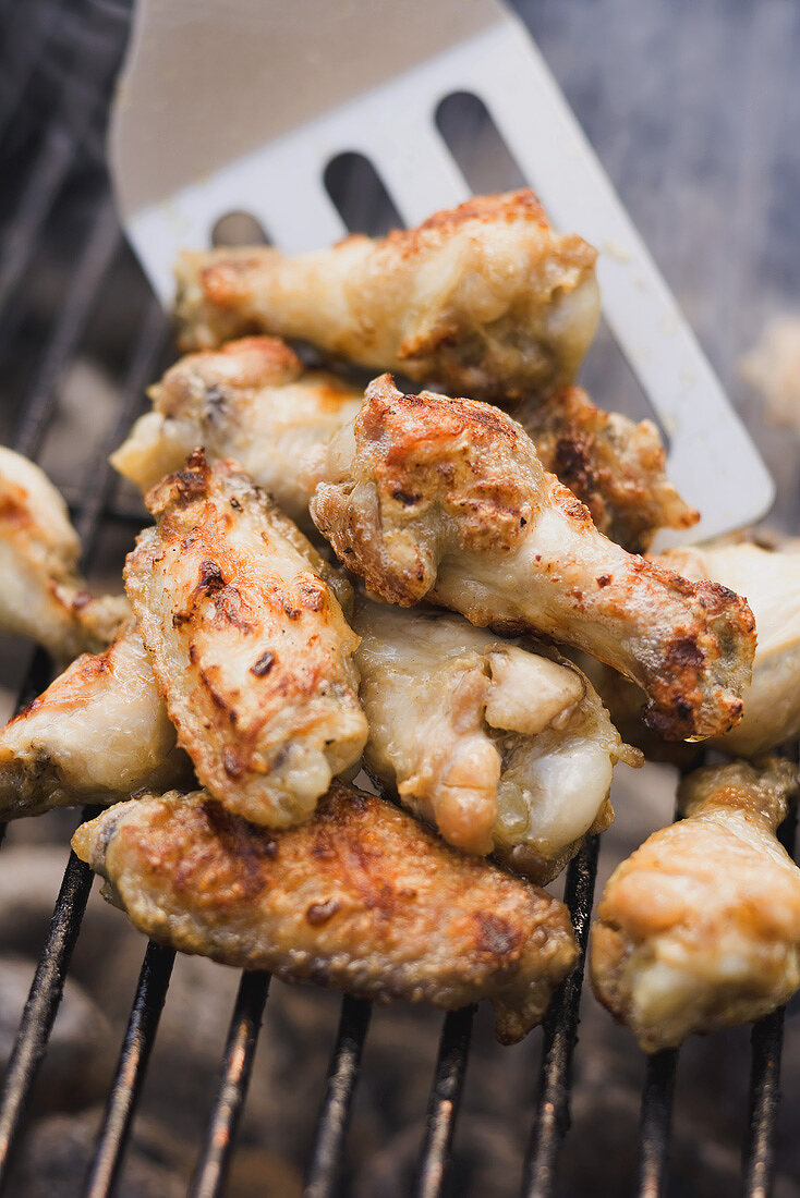 Chicken wings on a barbecue