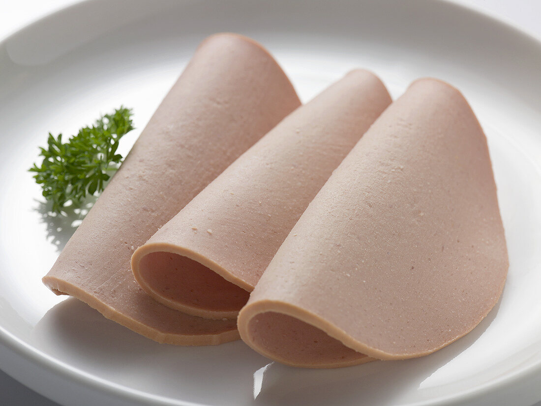 Three slices of Gelbwurst (pork and veal sausage)