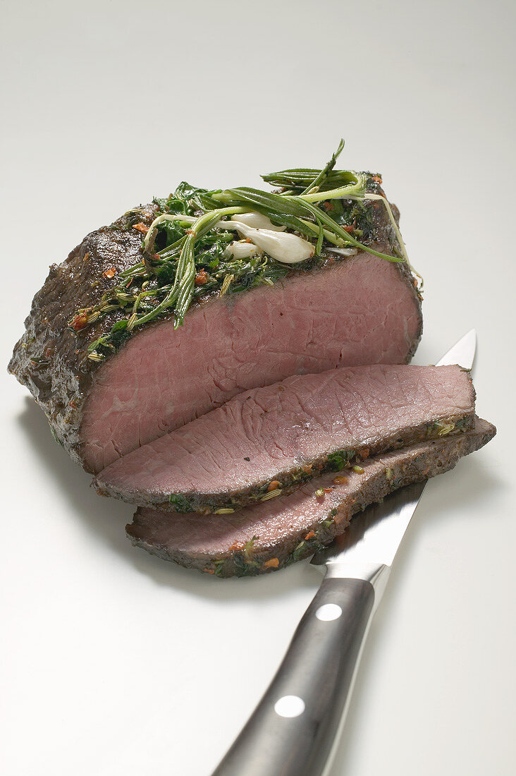 Roast beef, partly carved