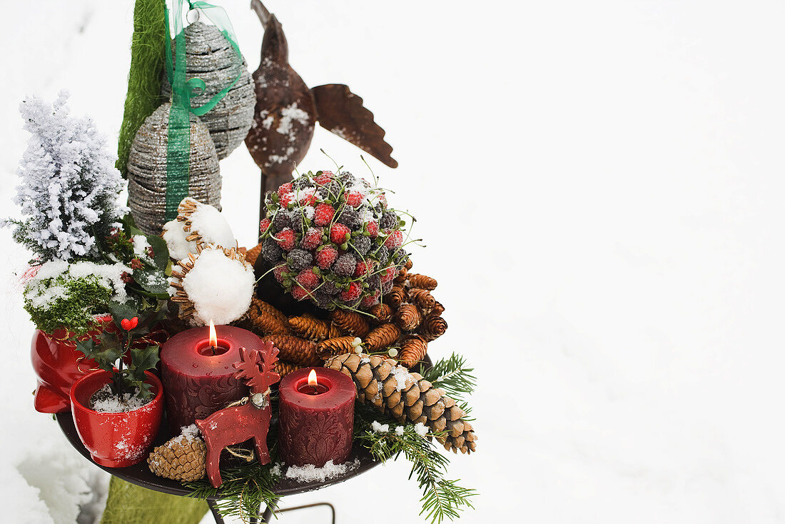 Christmas decorations on table out of doors