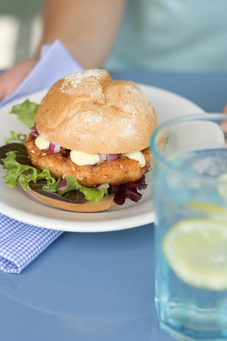 Woman holding burger