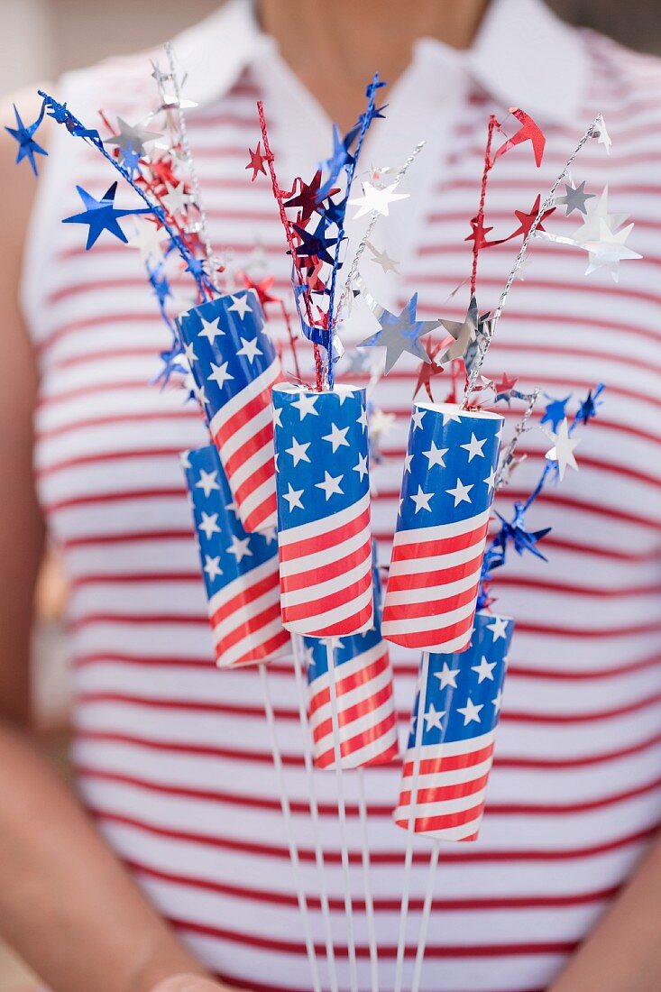 Woman holding sparklers (4th of July, USA)