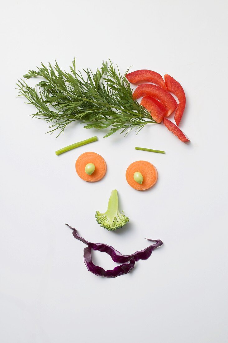 Amusing face made from vegetables and dill