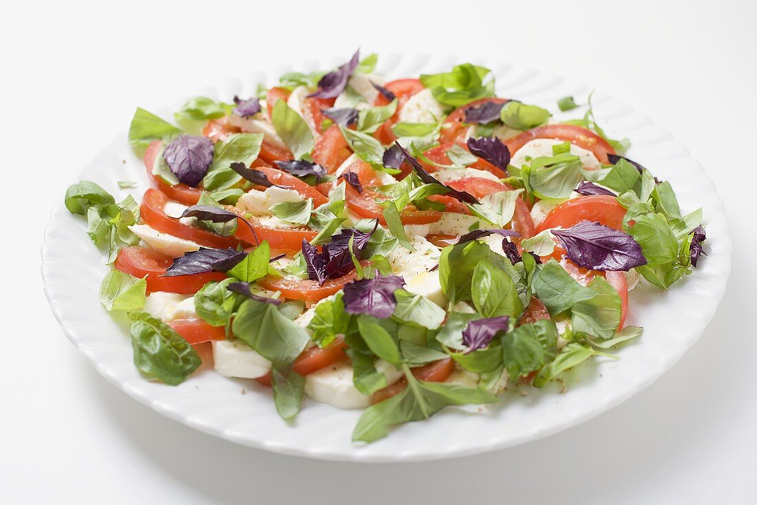 Tomatoes with mozzarella and basil