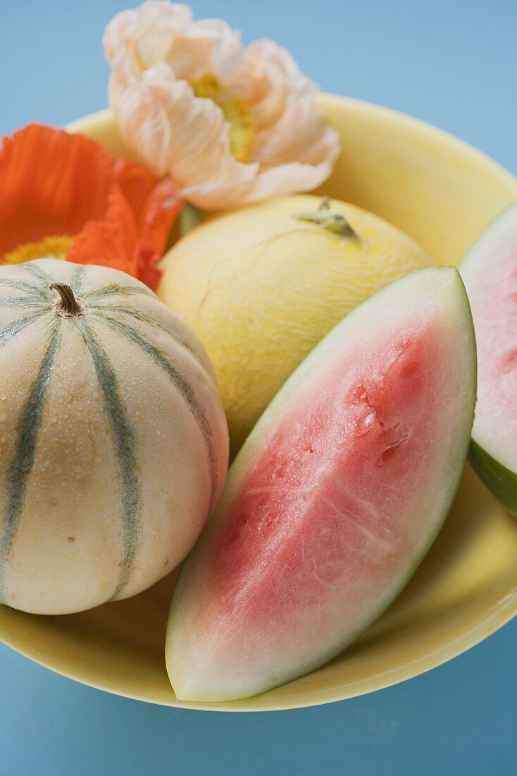 Three different melons in bowl (detail)