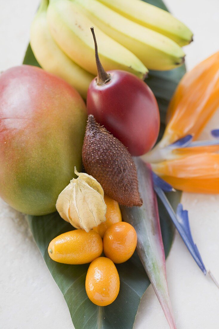 Assorted exotic fruits on banana leaf