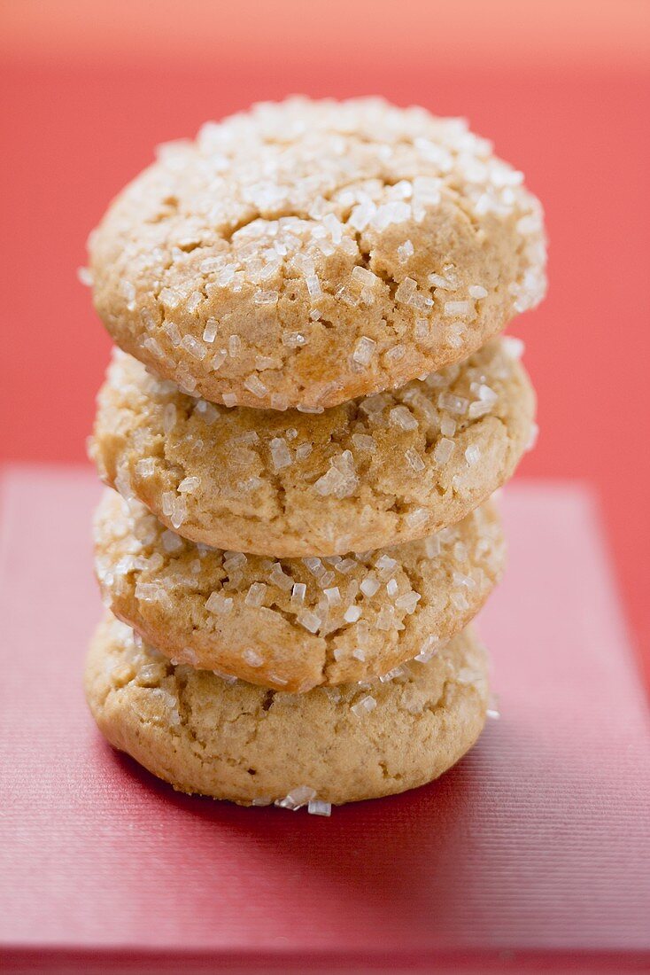 Four sugared biscuits, stacked