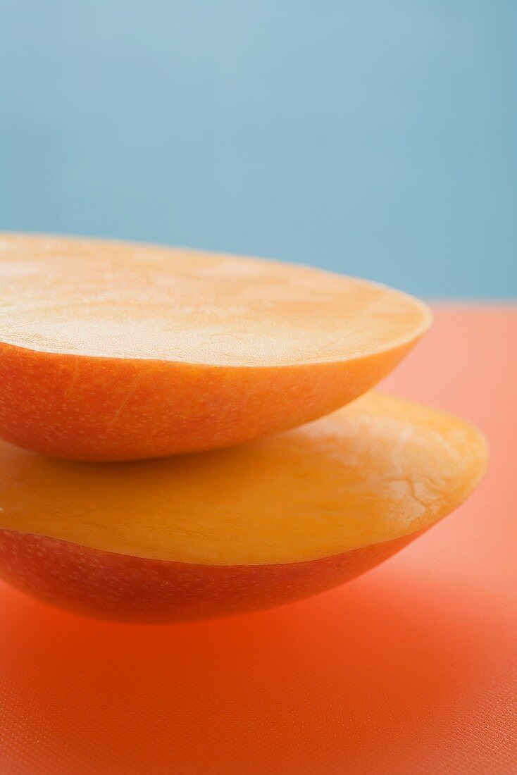 Two mango halves