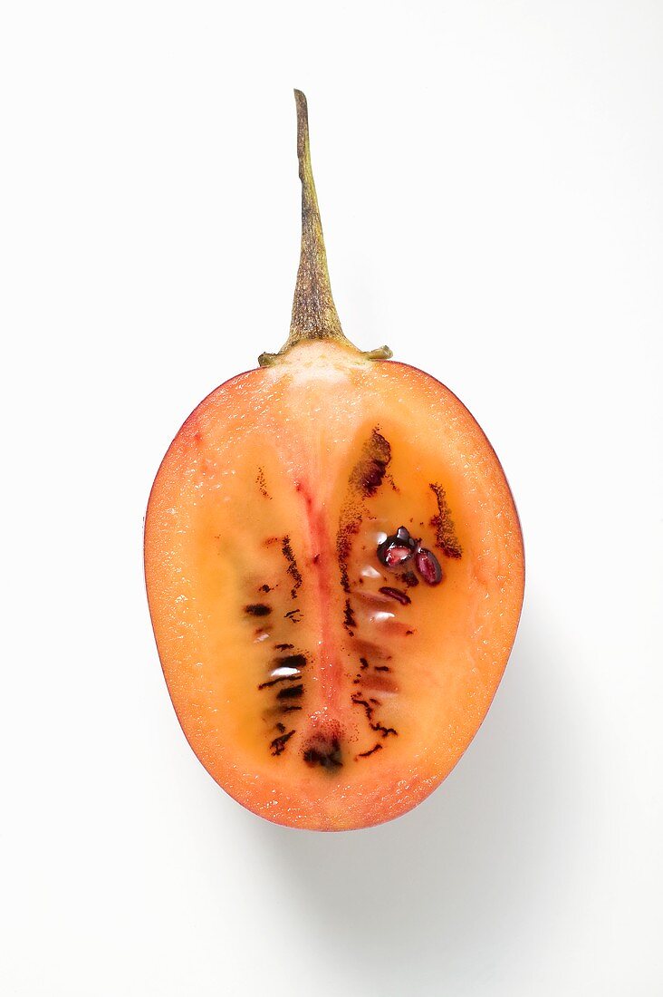 Half a tamarillo (overhead view)