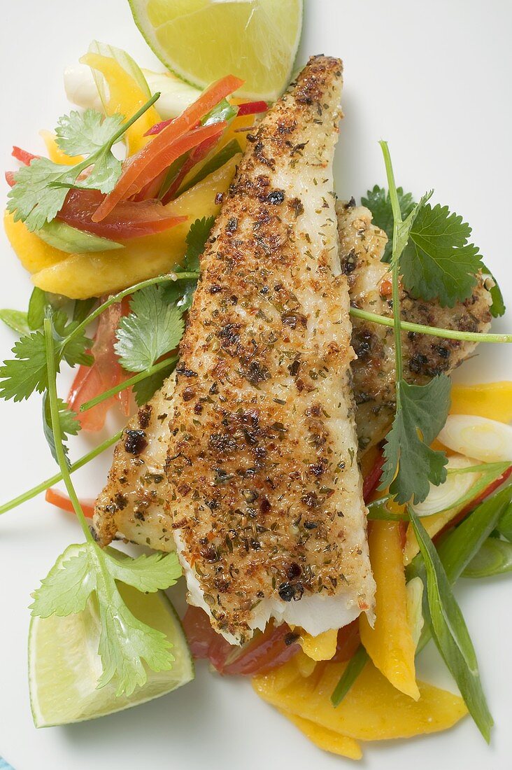 Spicy pangasius fillet with vegetables, lime, coriander