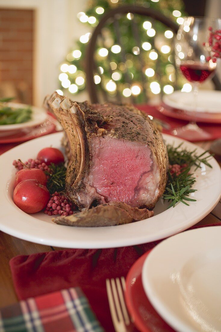 Roast rib of beef on Christmas table