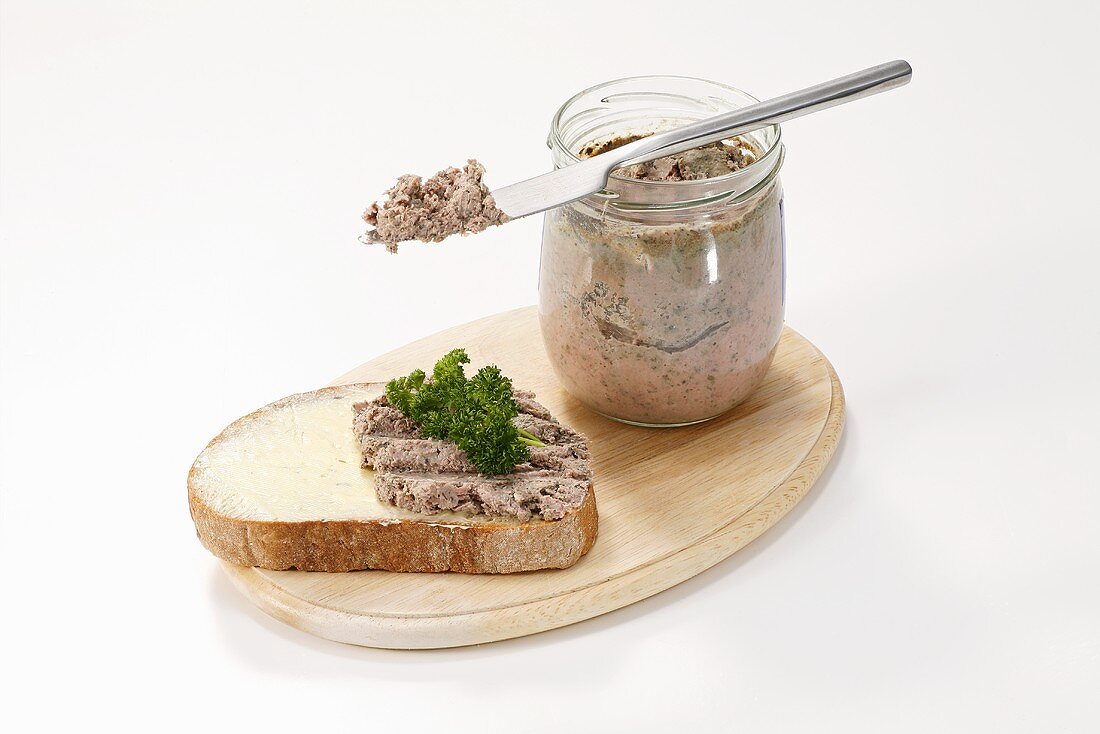 Liver sausage in jar and on bread