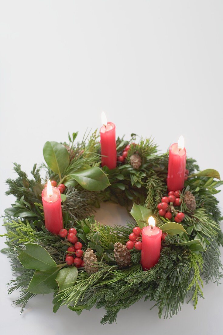 Advent wreath with four burning candles