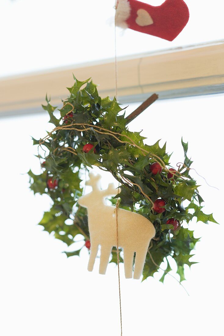 Christmas window decoration (holly and reindeer)
