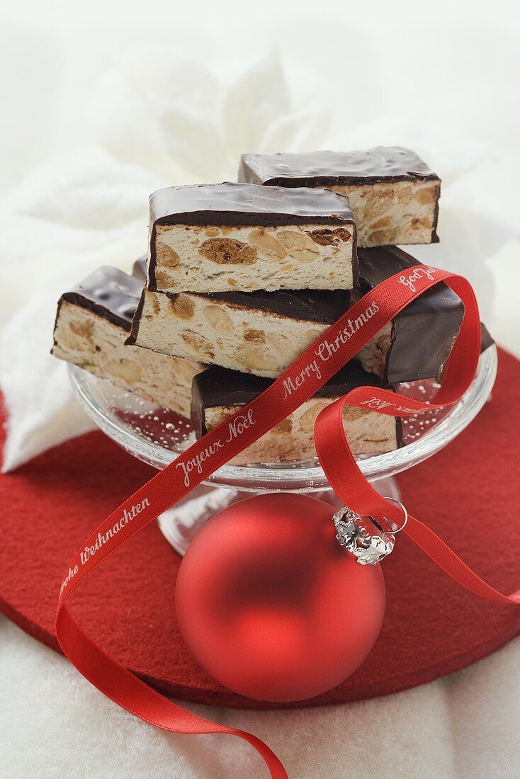 Chocolate-coated almond sweets for Christmas