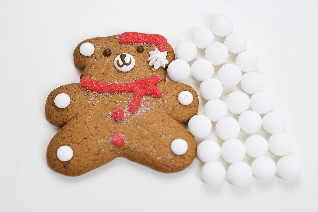 Christmas biscuit (teddy bear) and white sweets