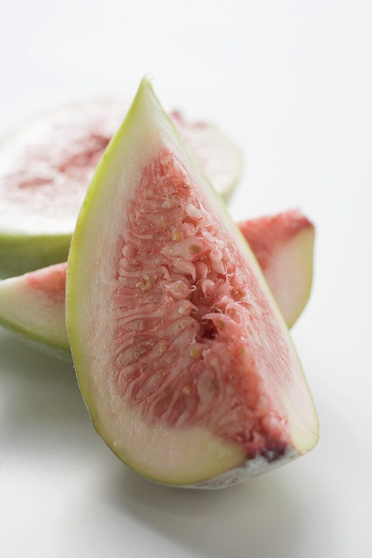 Fresh fig, cut into one half and two quarters