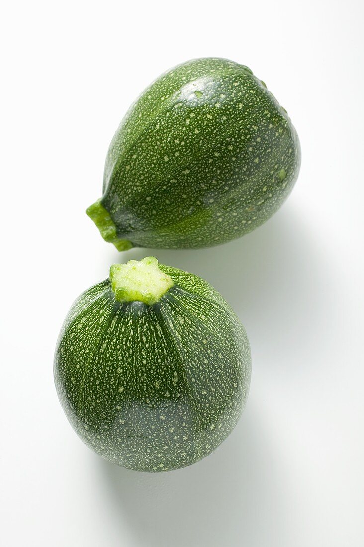 Two round courgettes