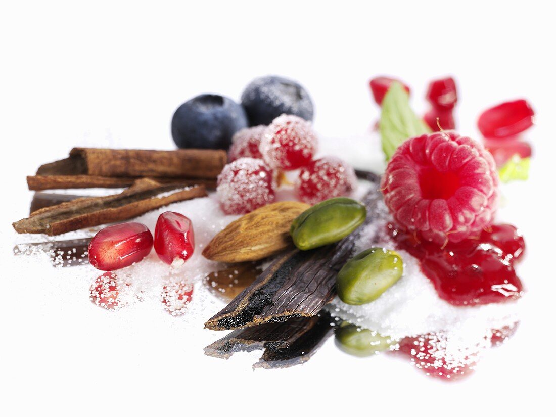 Stiff life: sugar, berries, pistachios, almonds, cinnamon etc.
