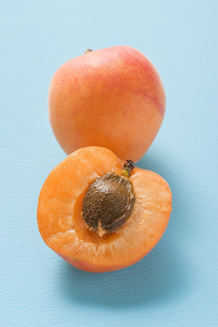 Half an apricot and whole apricot