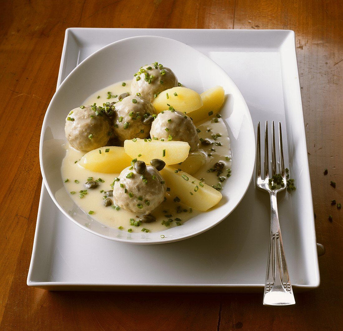 Königsberger Klopse (meatballs in white sauce with capers), potatoes