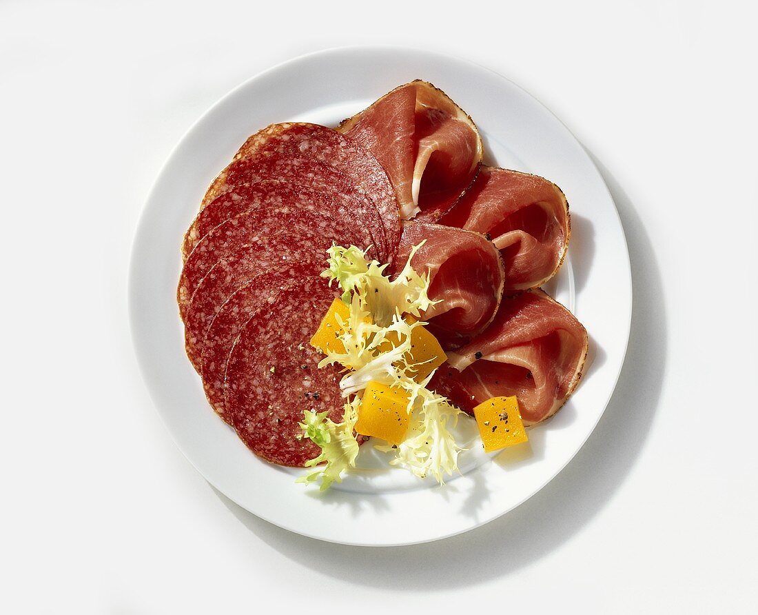 Cold cut plate (salami, raw ham) with sweet & sour pumpkin