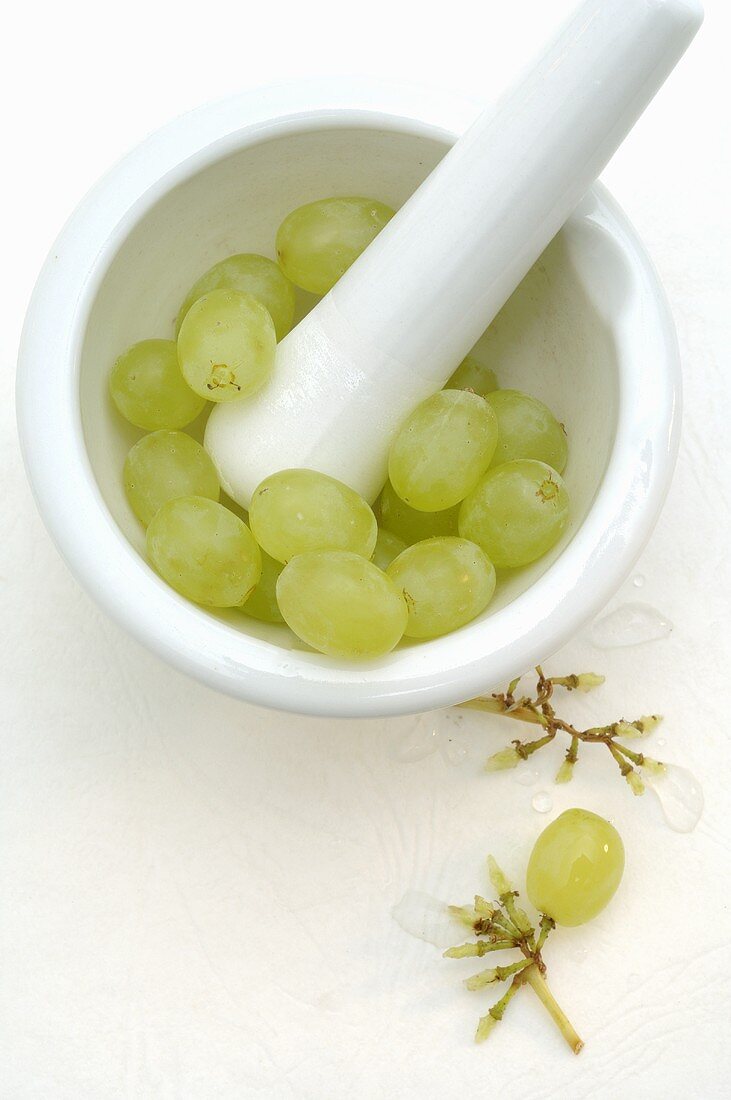 White grapes in a mortar