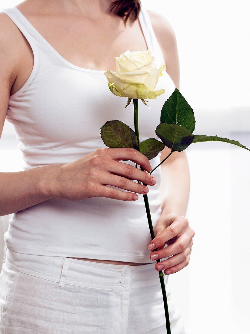 Woman with a white rose