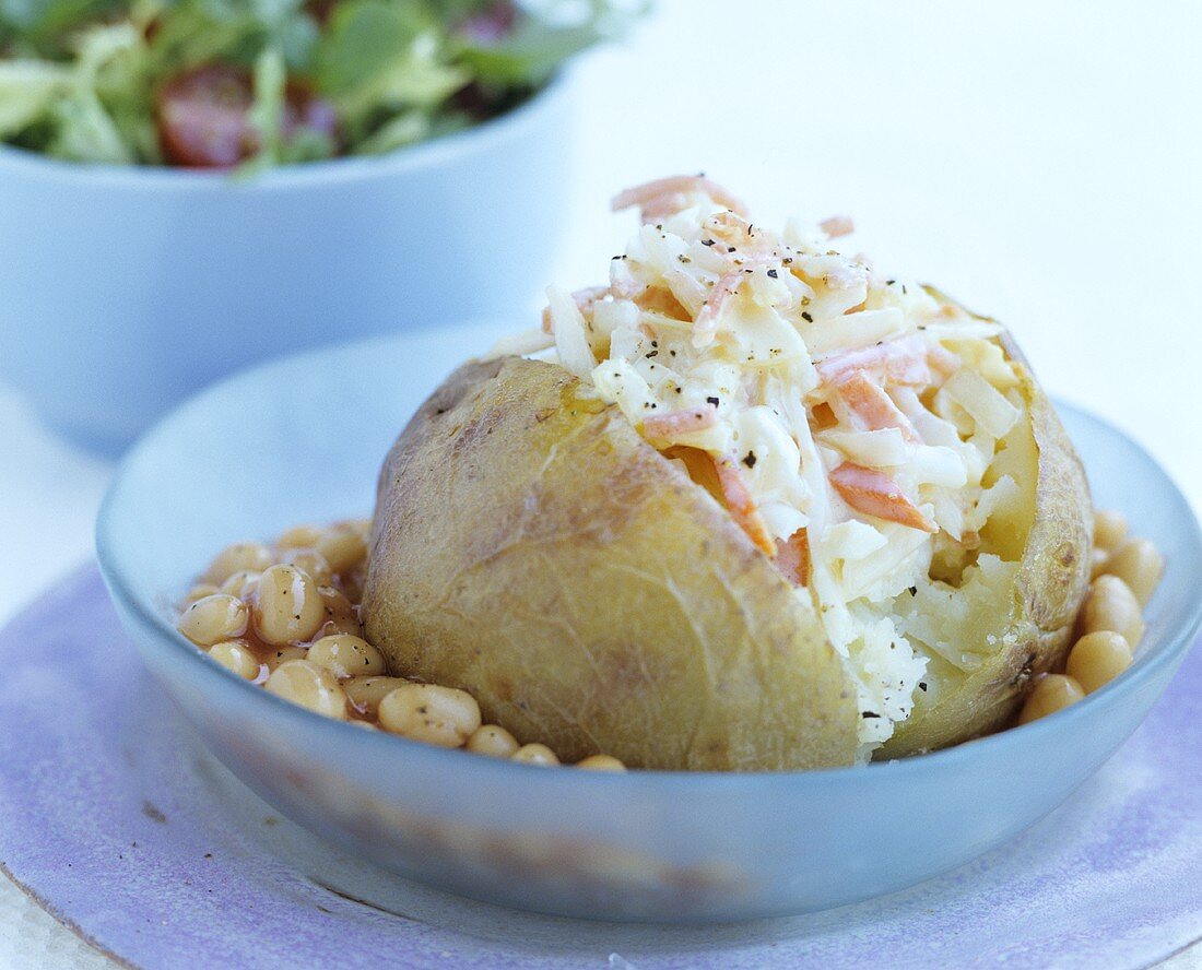 Baked potato with coleslaw and baked beans