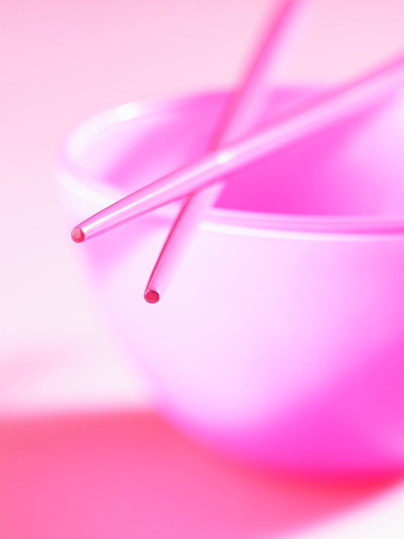 Bowl with pink chopsticks