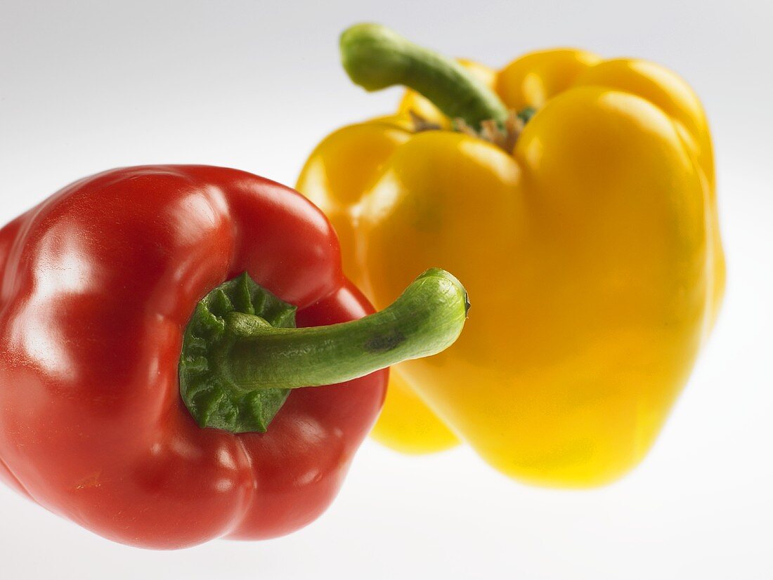 A red and a yellow pepper