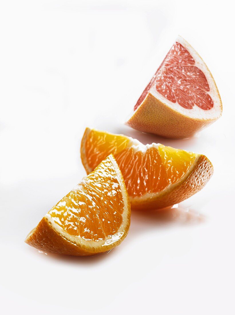 Wedges of orange and pink grapefruit