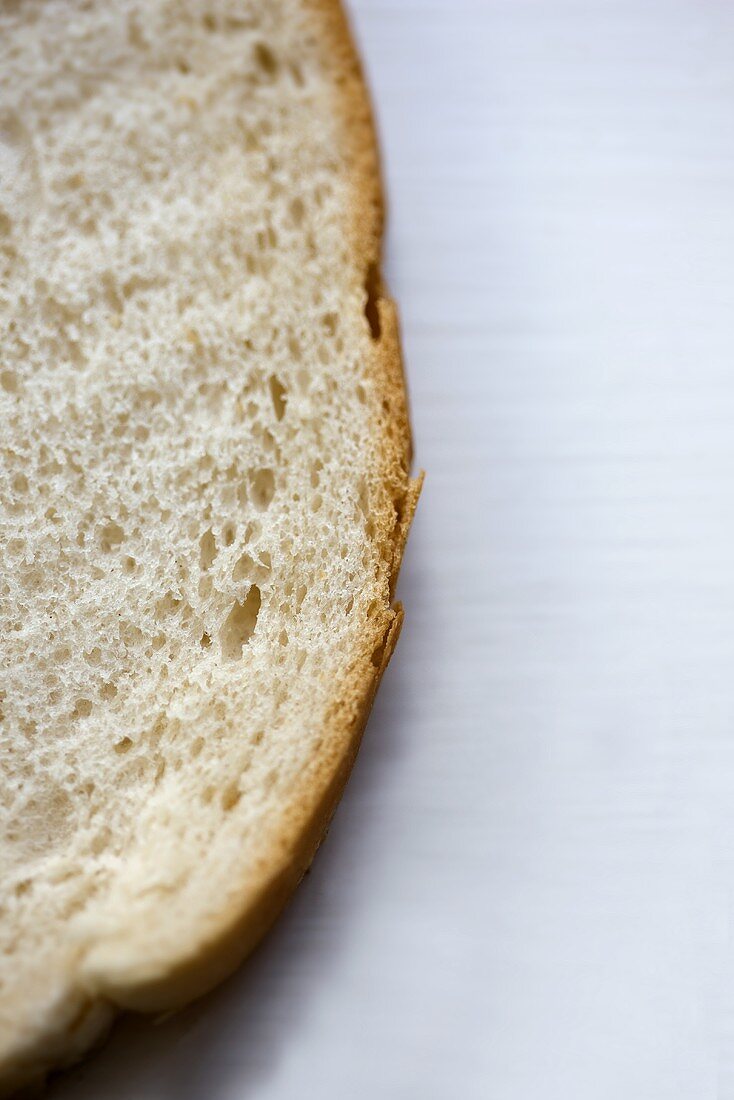 Part of a slice of white bread