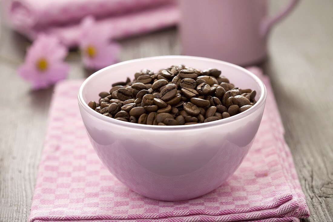 A small bowl of coffee beans