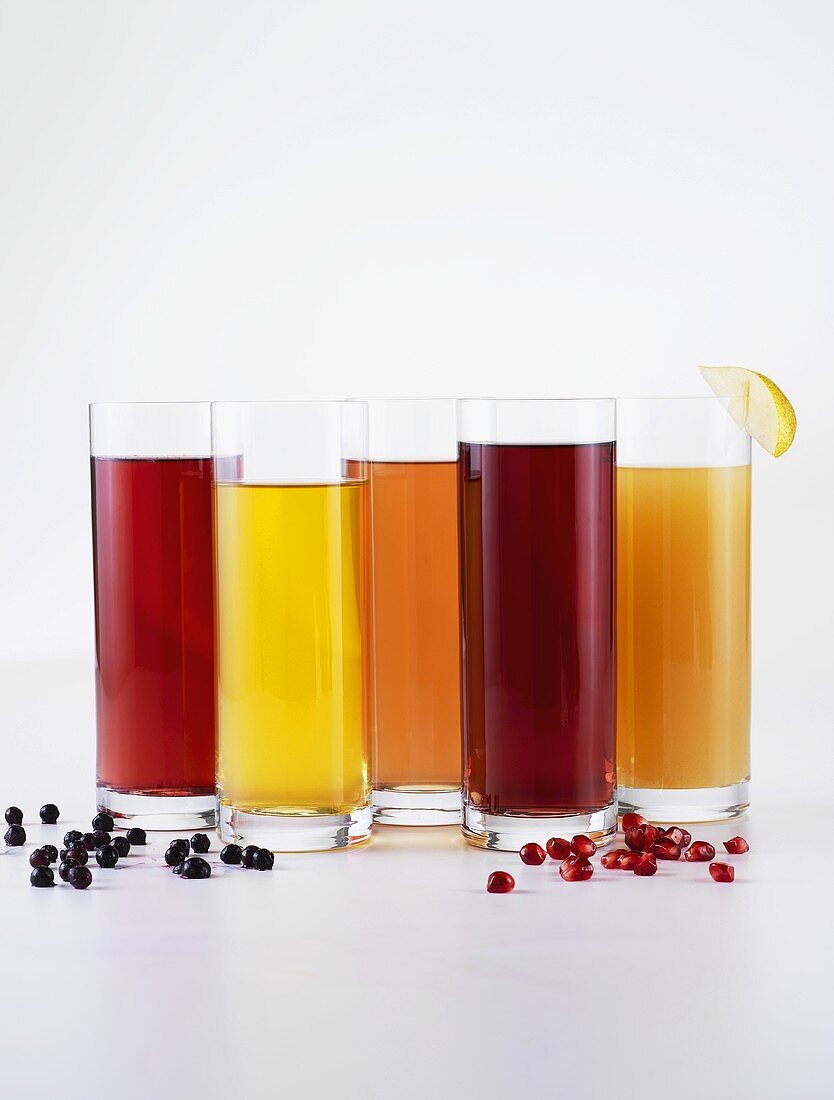 Various glasses of fruit juices