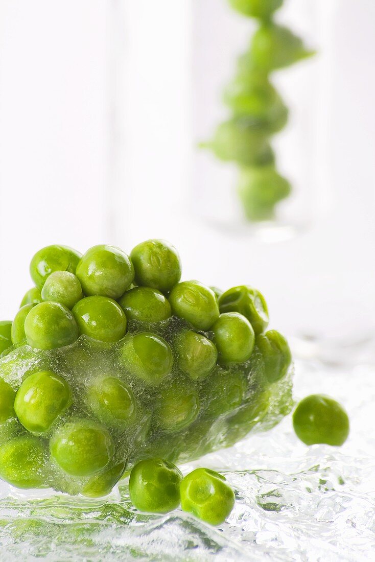 Frozen peas in a block of ice