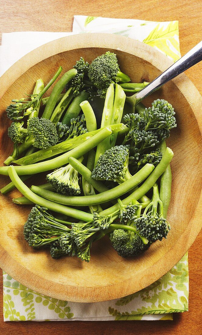 Broccoli and Green Beans in a Wooden Bowl