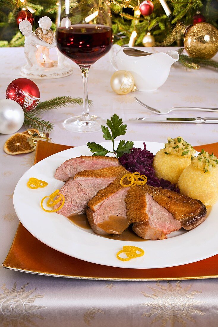 Duck breast with red cabbage and potato dumplings for Christmas dinner
