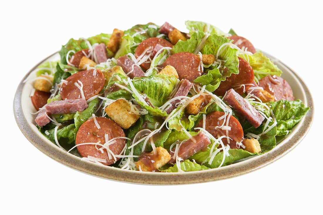 Salad with Romaine, Salami, Cheese and Croutons; White Background