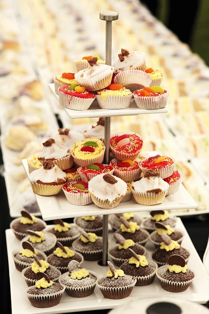 Assorted cupcakes on tiered stand