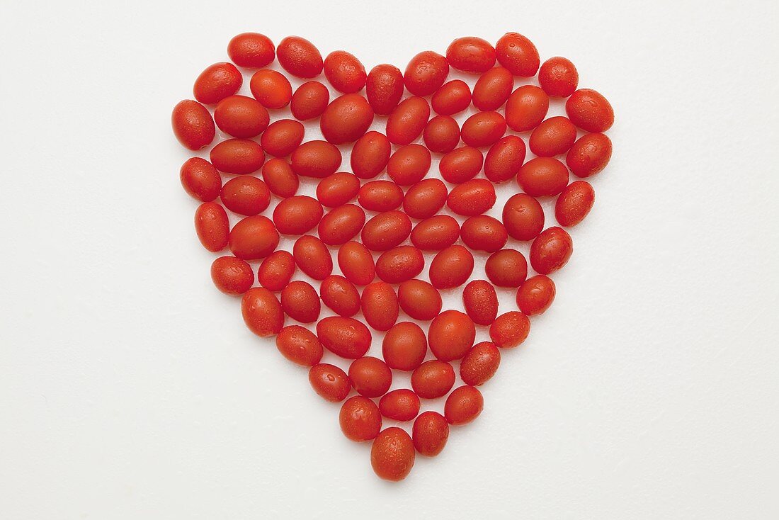 A heart shaped out of plum tomatoes